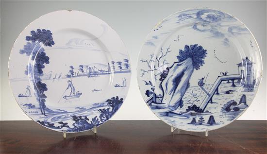 Two English delft ware chargers, 33.5cm and 34.5cm, latter with small area of restoration